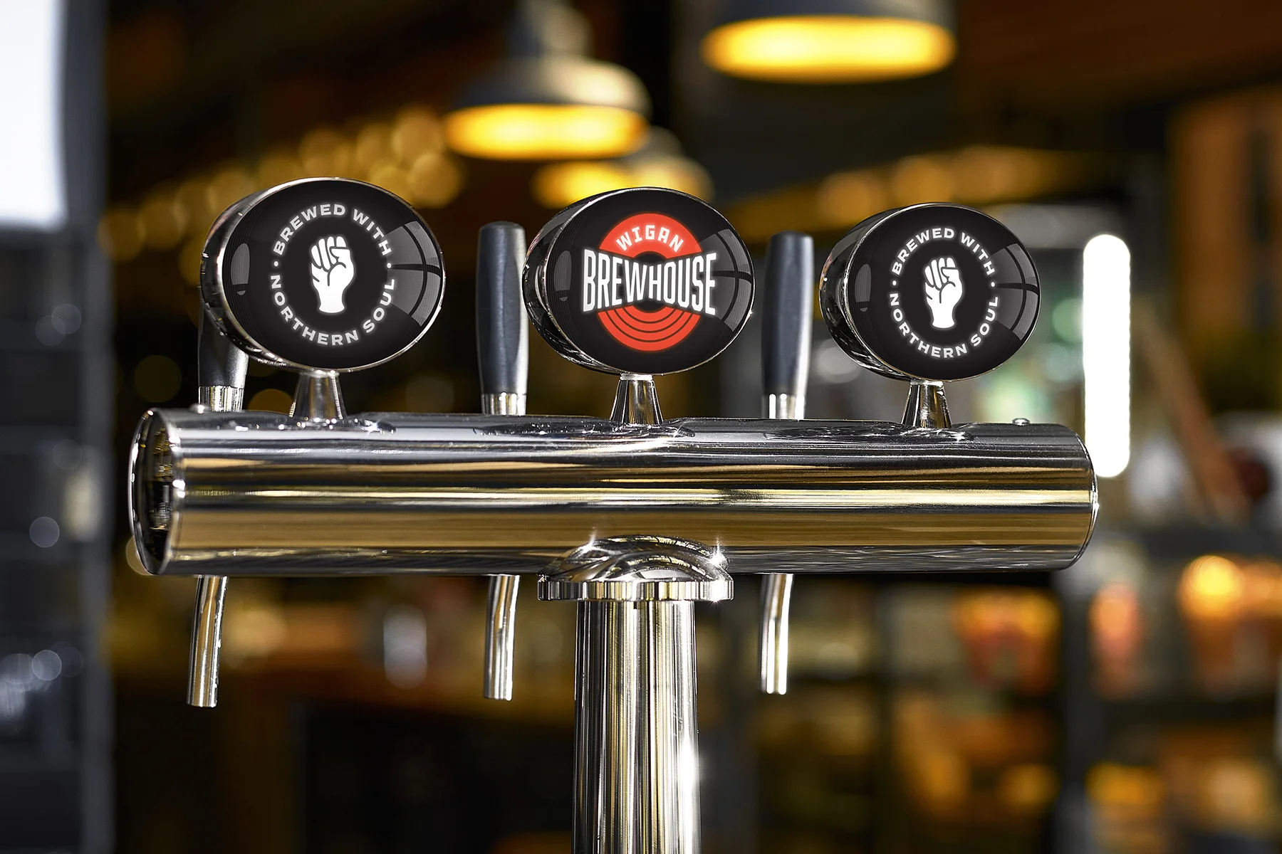 Wigan Brewhouse keg lens designs on bar taps