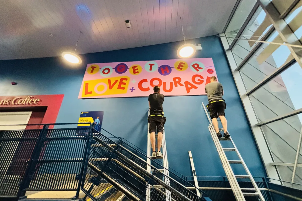 Heart of Glass 2026 Together in Love and Courage wall mural fitting